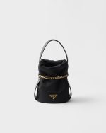 Petit Sac Noir Re-Nylon and nappa leather mini bucket bag